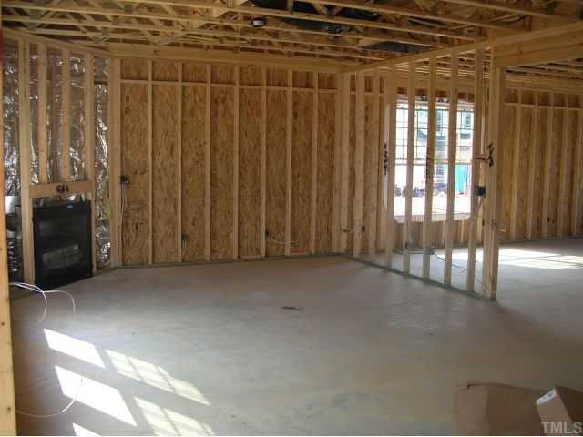 2513 Goldeneye Court Raleigh, NC 27606 - Photo 4 of 7 Den/Family/Great Room