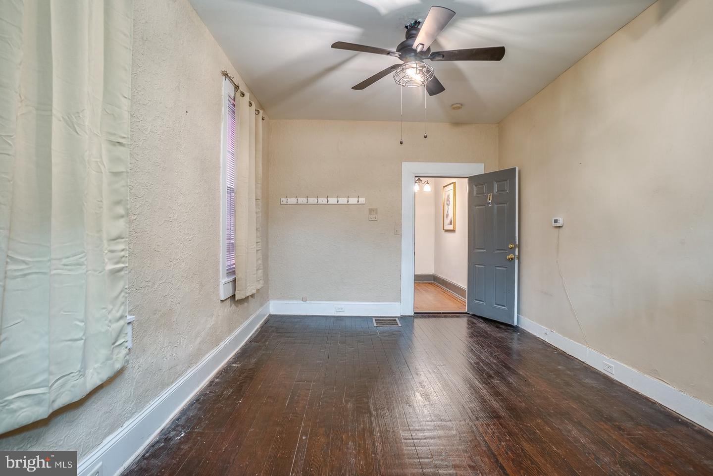 1420 Light Street, Unit 1R Baltimore, MD 21230 - Photo 3 of 8 a view of an empty room and window