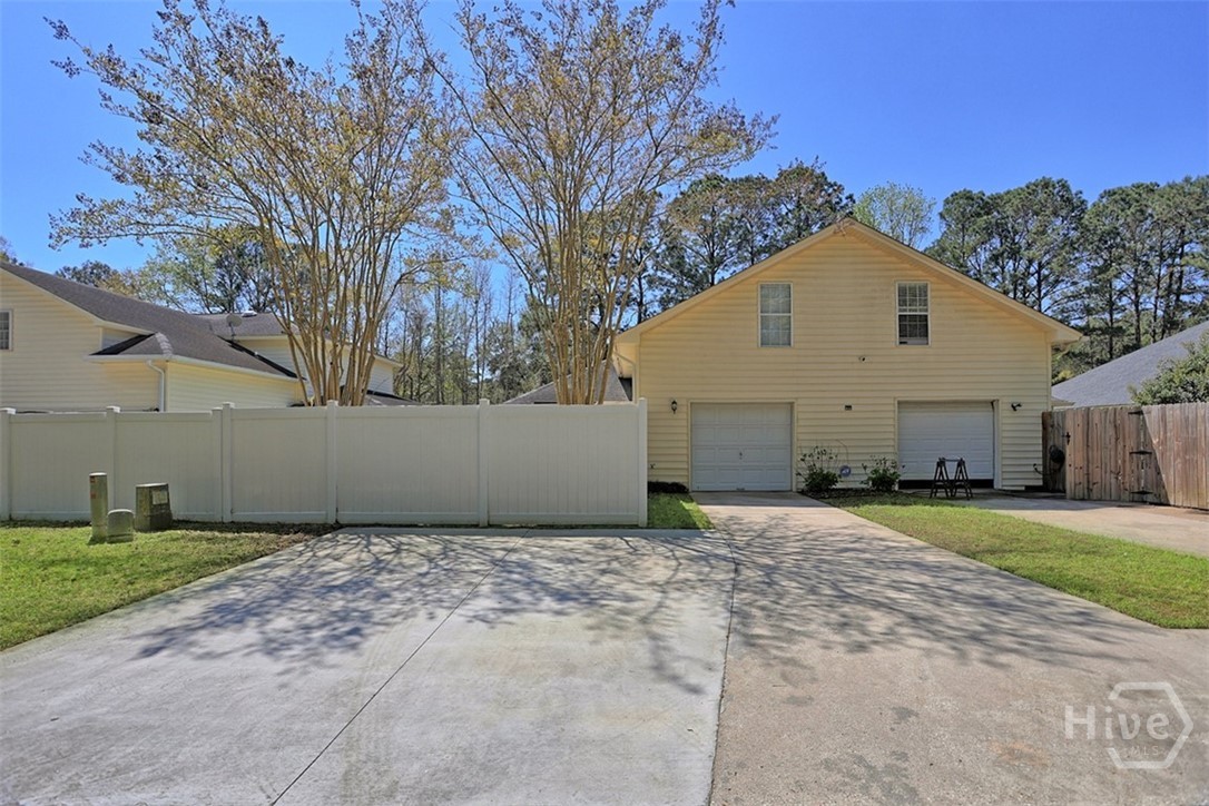 120 Trellis Way Savannah, GA 31419 - Photo 13 of 36 Rear entry garage with driveway & 2 car parking pad
