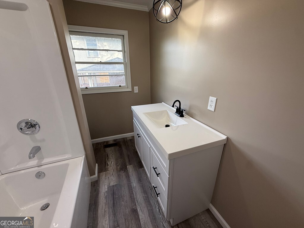 412 Roberson Street Dublin, GA 31021 - Photo 35 of 54 a utility room with a window dryer and washer