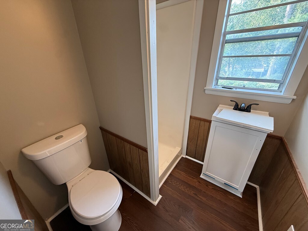 412 Roberson Street Dublin, GA 31021 - Photo 54 of 54 a bathroom with a toilet and a sink