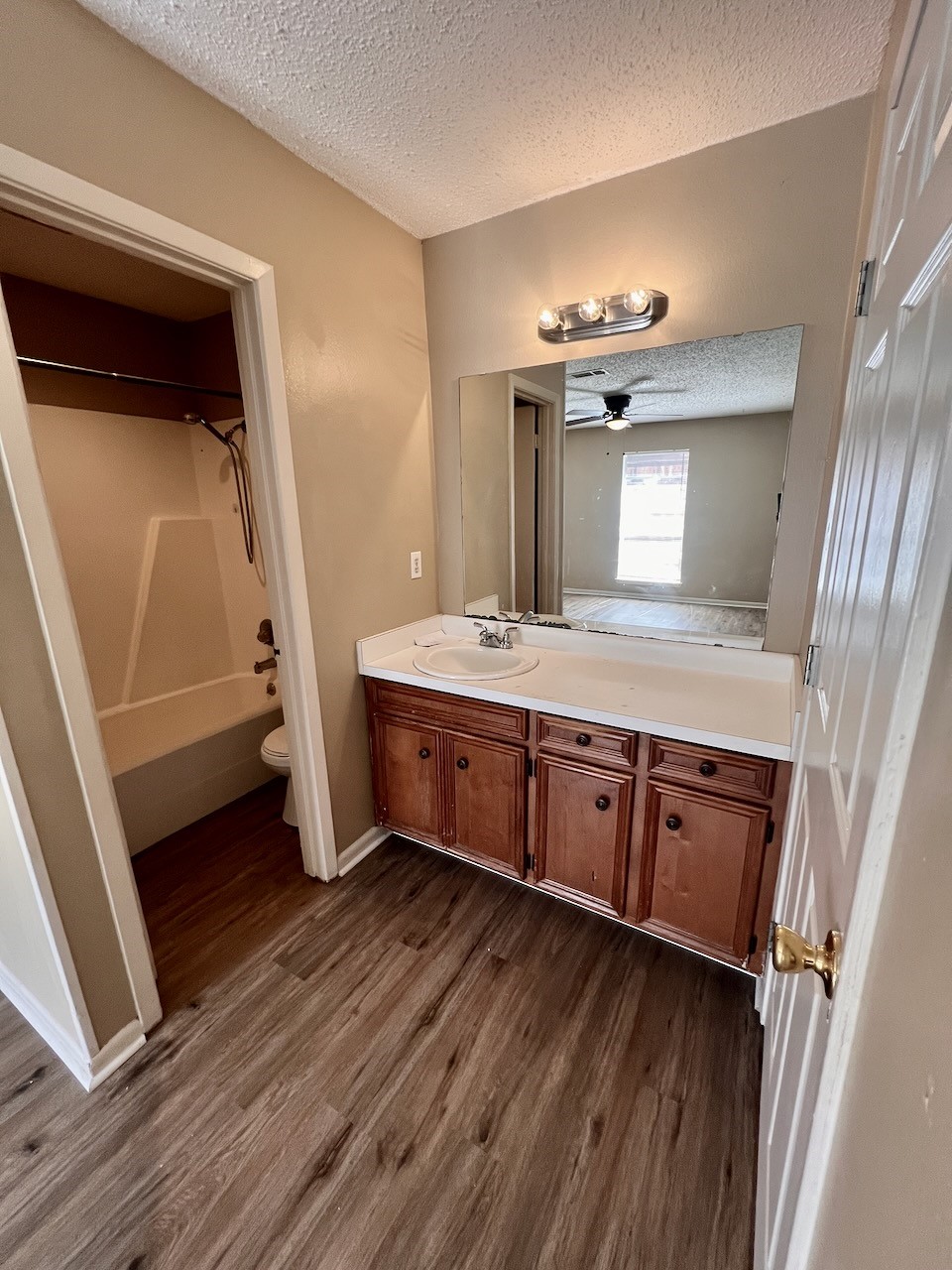 1650 Shirley Circle Beaumont, TX 77707 - Photo 11 of 14 a bathroom with a sink a mirror and vanity