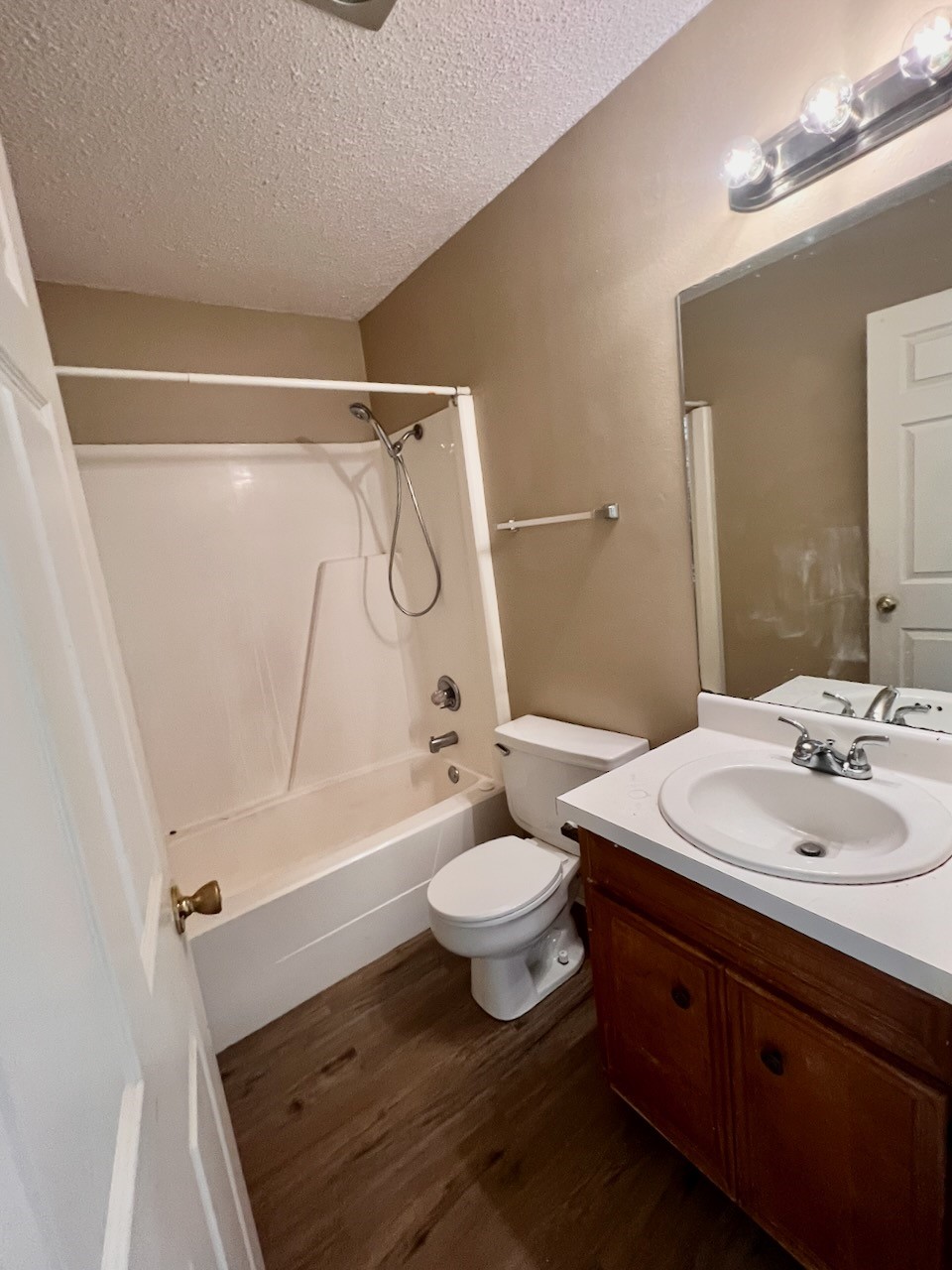 1650 Shirley Circle Beaumont, TX 77707 - Photo 8 of 14 a bathroom with a sink a toilet and shower