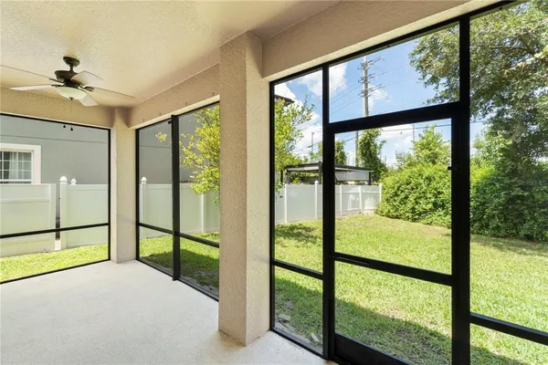 a view of a room with a large window