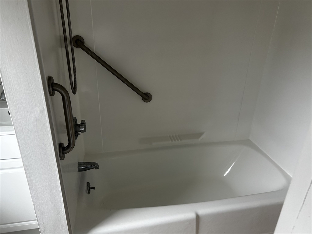 8 Beaver Dam Road, Unit B Scituate, MA 02066 - Photo 14 of 14 a bathroom with a bathtub