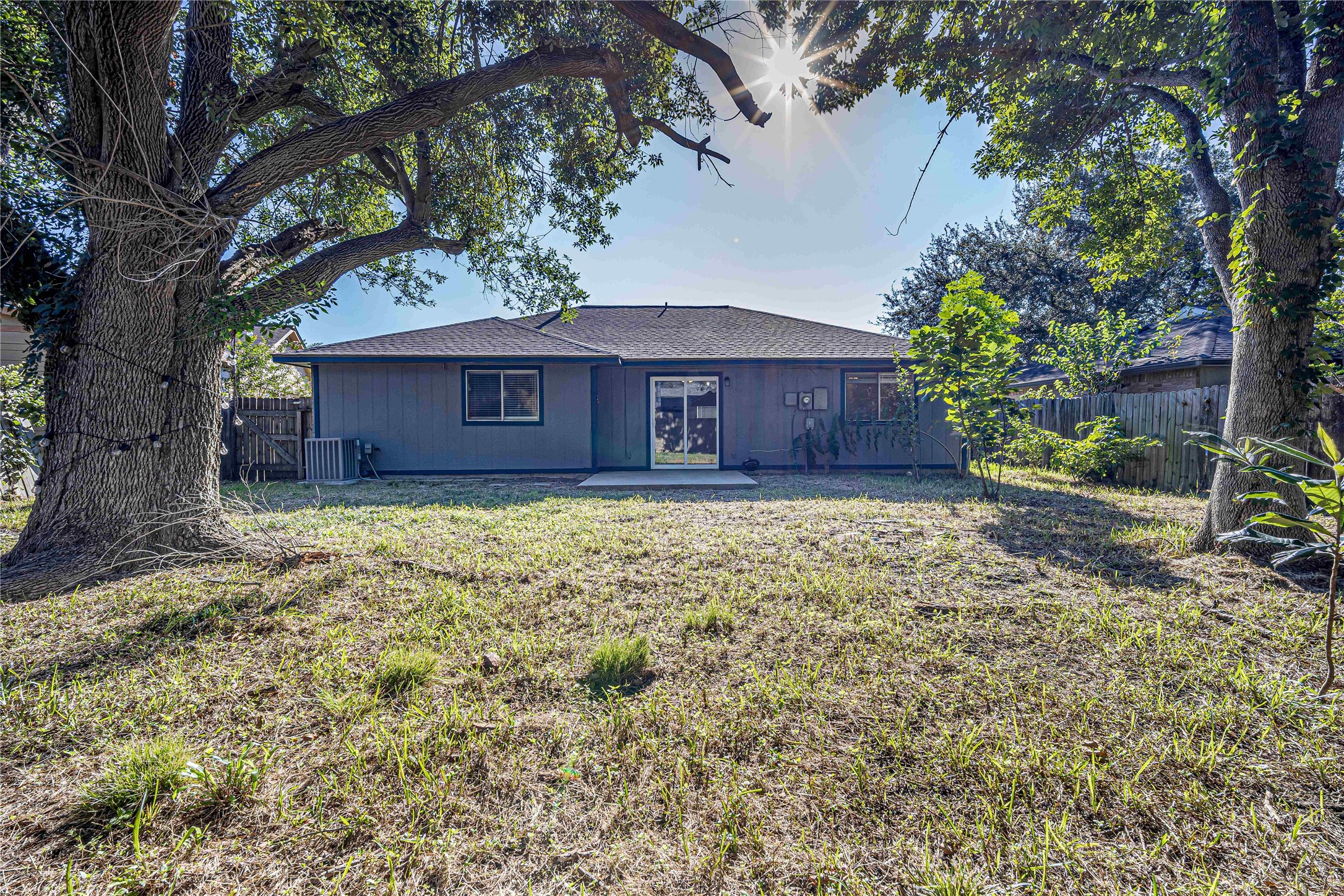 1010 Woodbridge Avenue Pearland, TX 77584 - Photo 14 of 14 a front view of a house with a garden