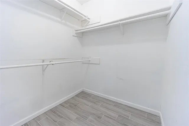 a view of a room with racks on the wall