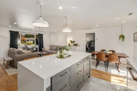 a view of a kitchen and dining room