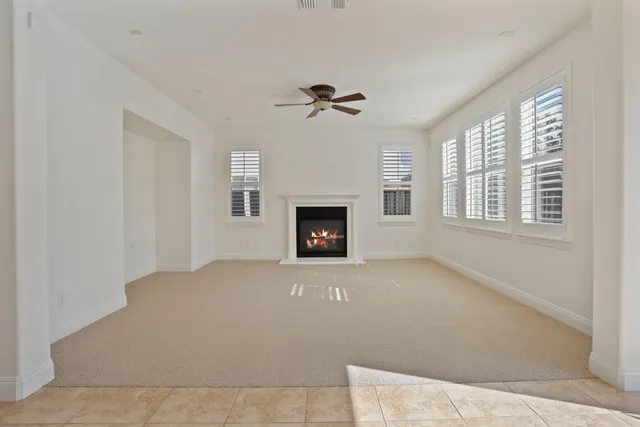 a large kitchen with cabinets and stainless steel appliances