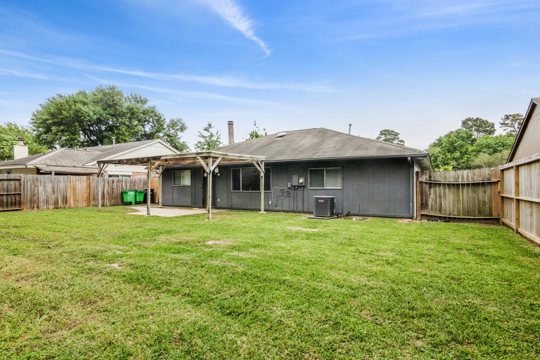 2531 North Spring Drive Spring, TX 77373 - Photo 24 of 24 a view of a house with a yard and sitting area