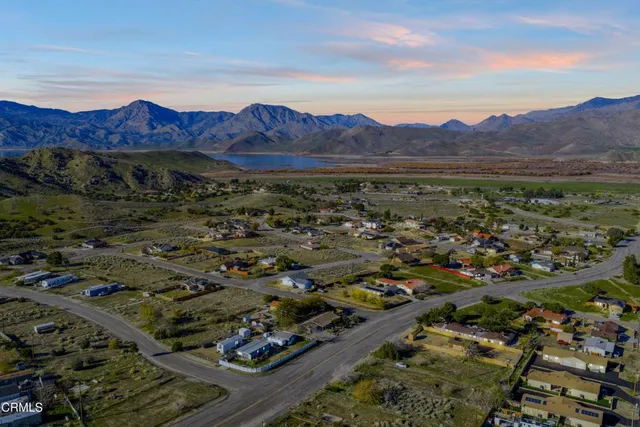 an aerial view of residential house and green space