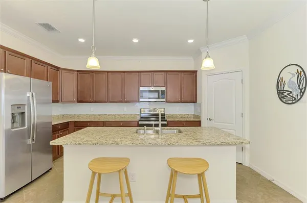$495,000 | 10435 Medjool Drive, Venice, FL 34293