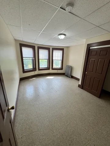 an empty room with windows