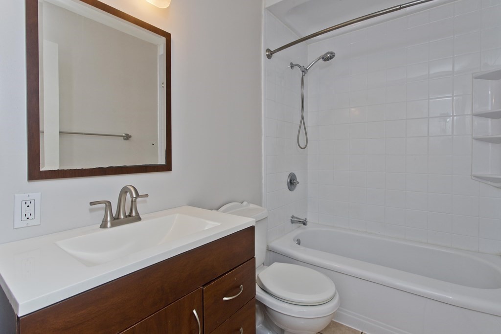61 Arbor Road Enfield, CT 06082 - Photo 25 of 39 a bathroom with a sink a toilet and shower