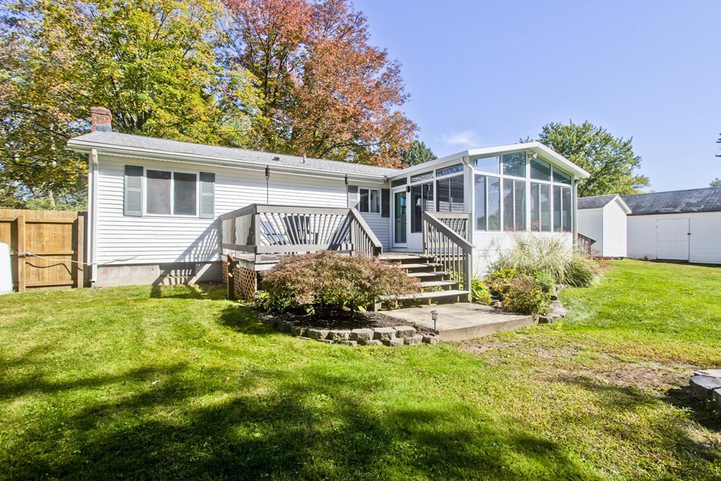 61 Arbor Road Enfield, CT 06082 - Photo 34 of 39 a front view of house with yard and green space