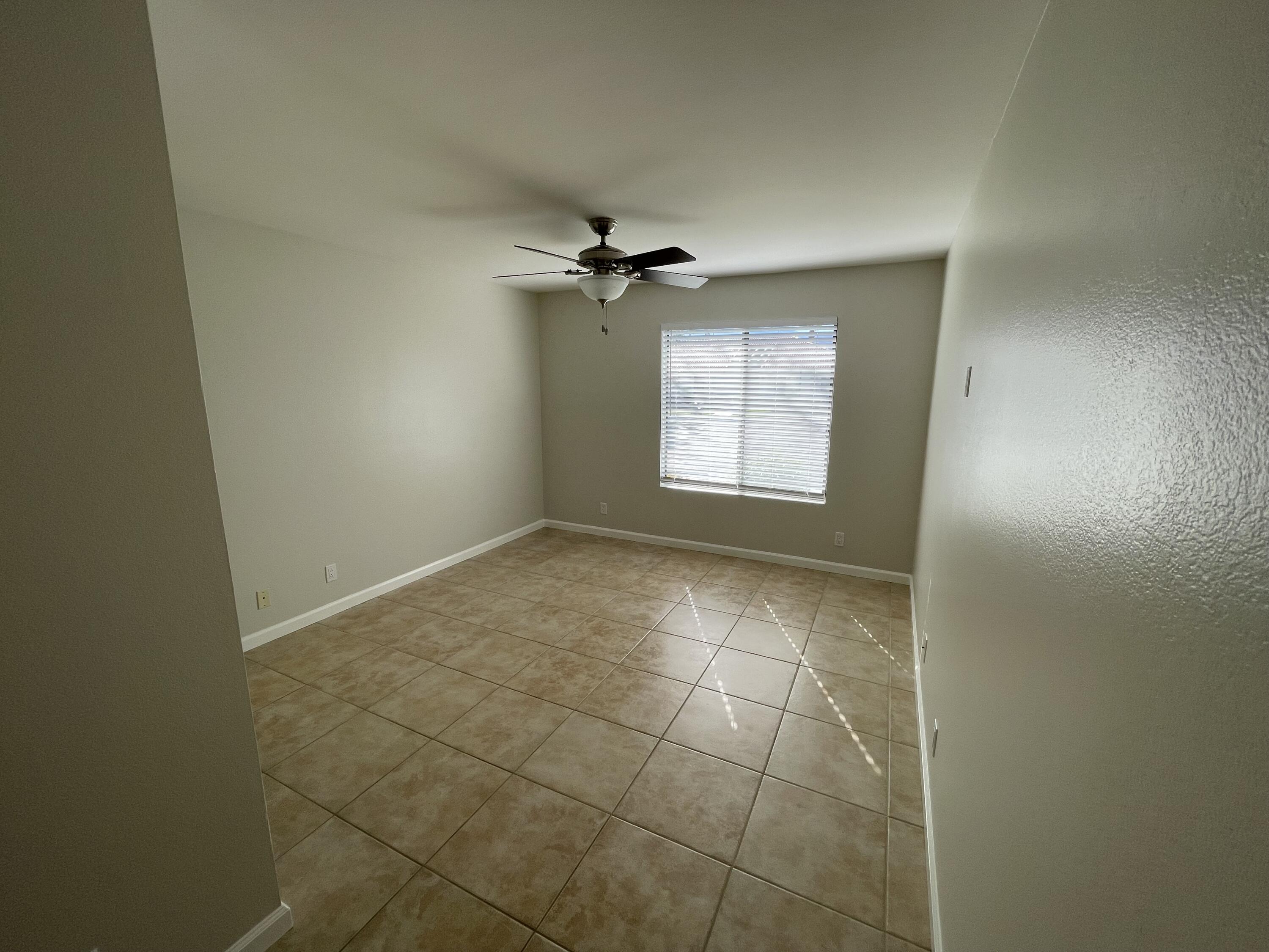 43376 Cook Street, Unit 38 Palm Desert, CA 92211 - Photo 15 of 33 a view of an empty room with a window