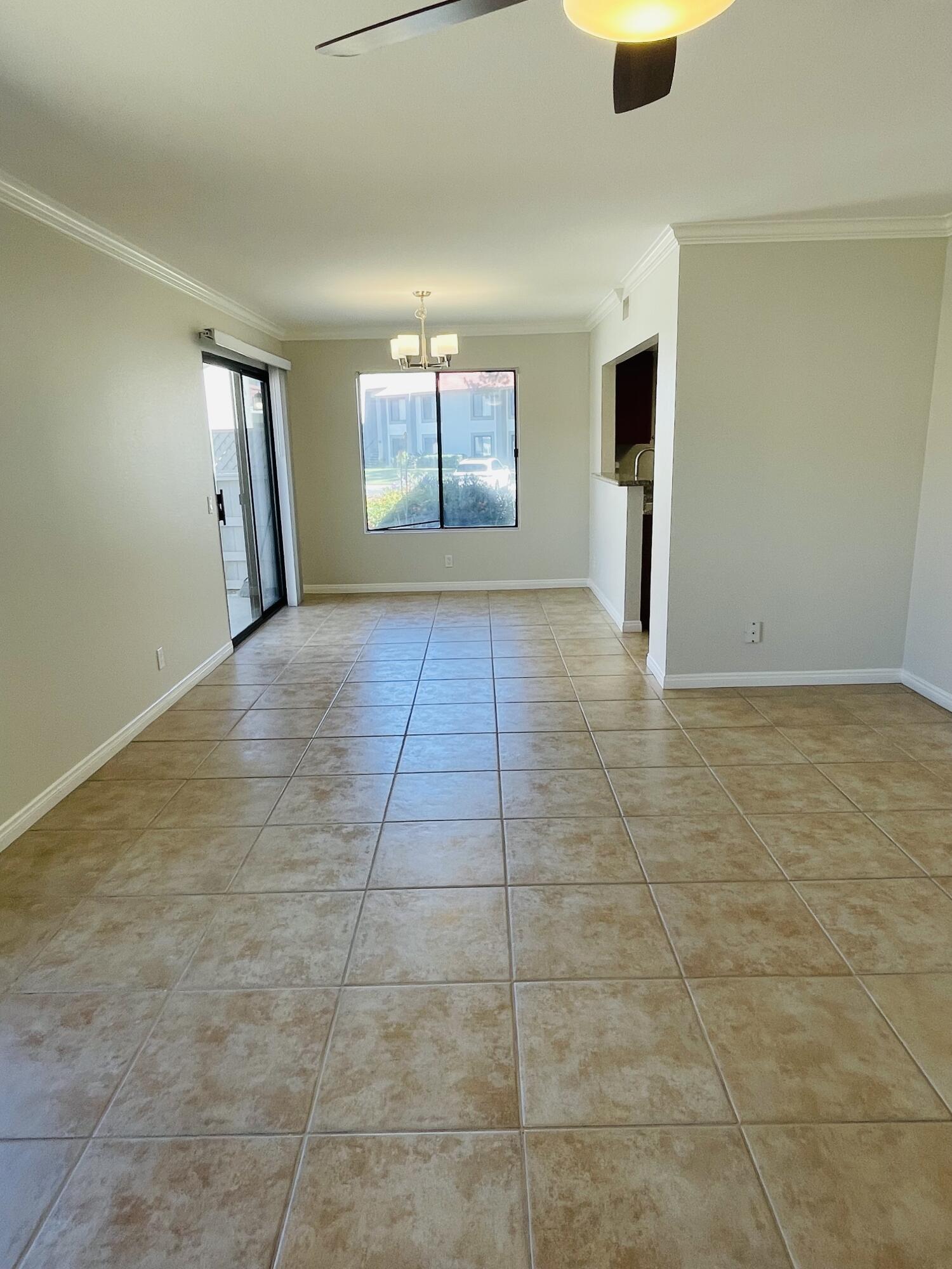 43376 Cook Street, Unit 38 Palm Desert, CA 92211 - Photo 2 of 33 a view of an empty room with a window