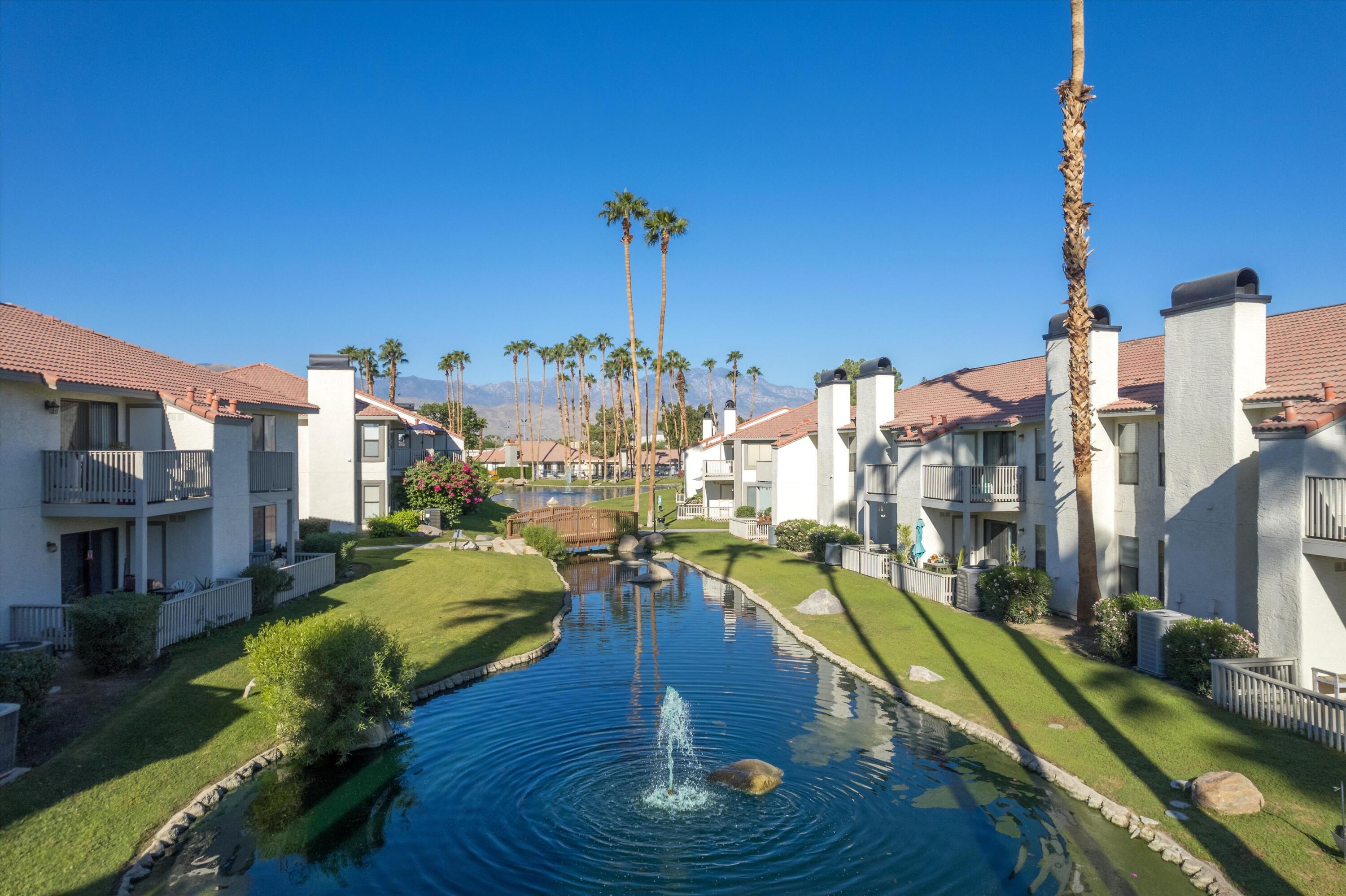43376 Cook Street, Unit 38 Palm Desert, CA 92211 - Photo 22 of 33 a view of a city with tall buildings