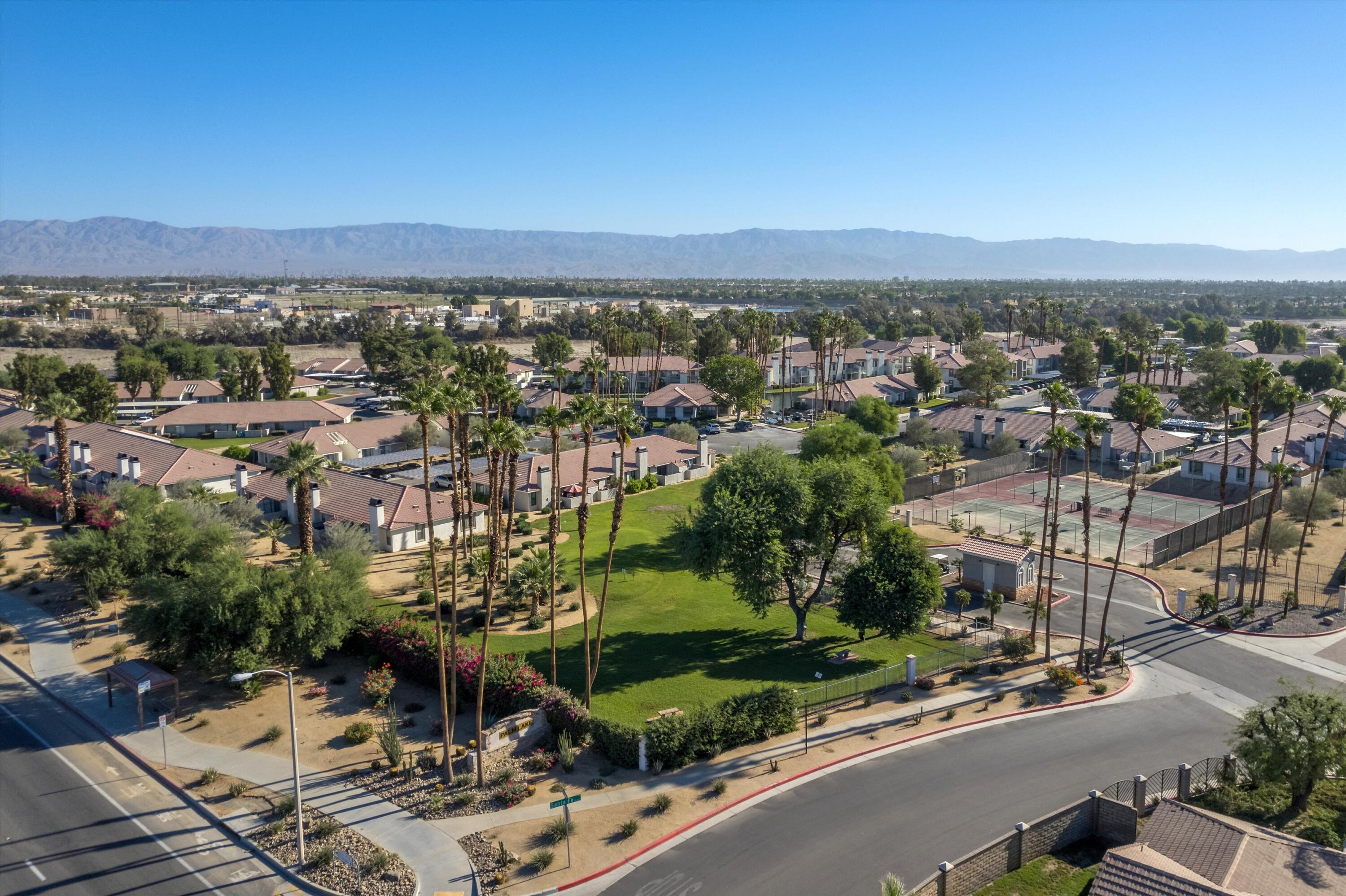 43376 Cook Street, Unit 38 Palm Desert, CA 92211 - Photo 32 of 33 an aerial view of a city with lots of residential buildings