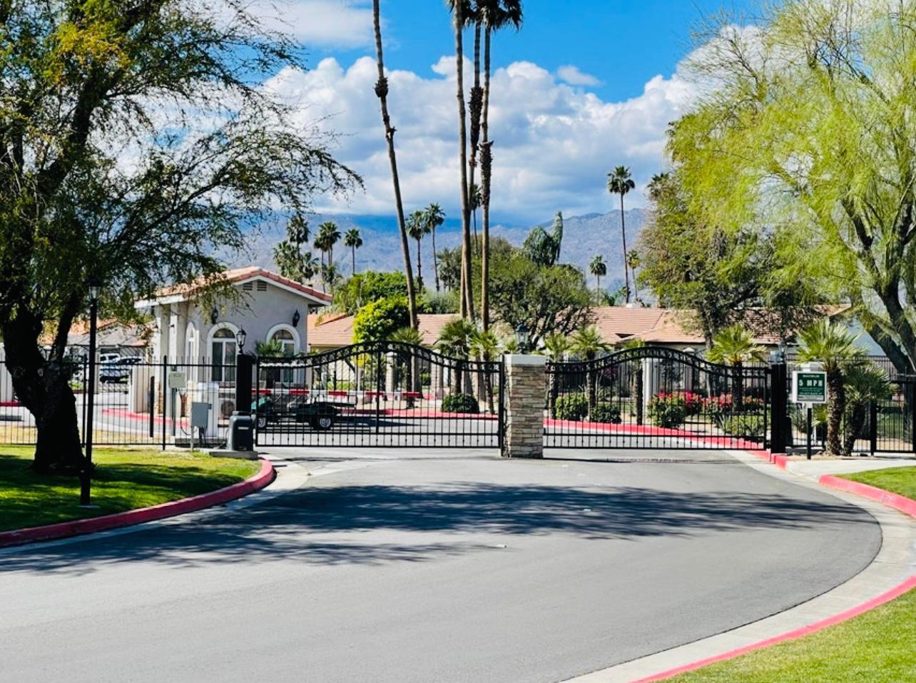 43376 Cook Street, Unit 38 Palm Desert, CA 92211 - Photo 33 of 33 a outdoor view of a building with traffic signal lights
