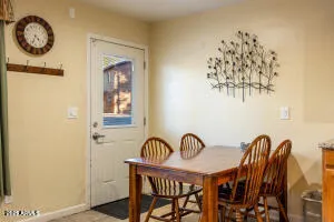 a bedroom with a bed dresser and a window