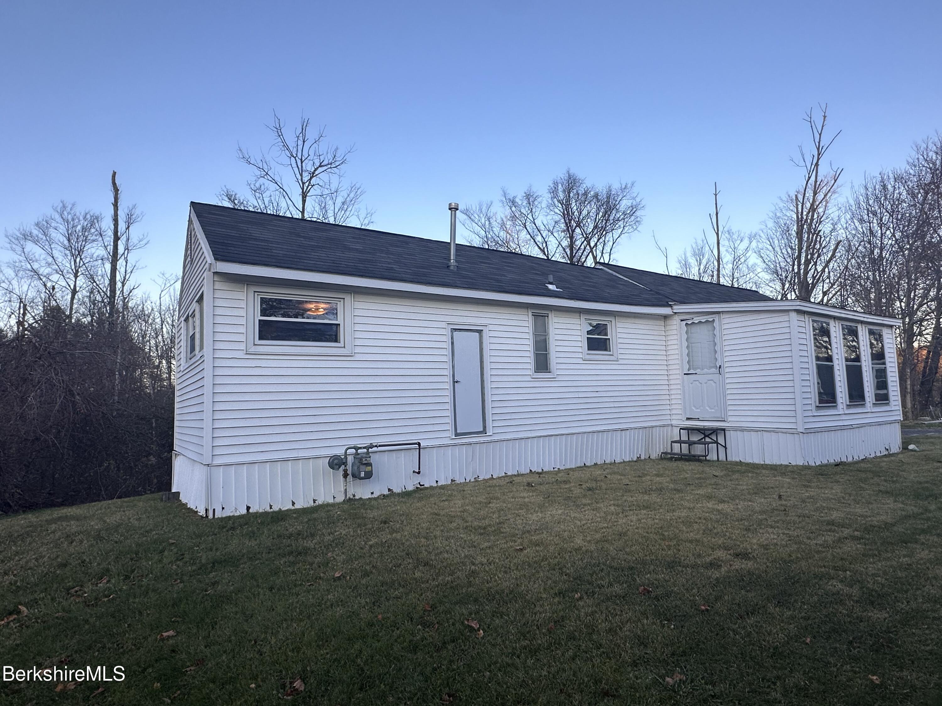 405 Pittsfield Lenox Road, Unit E6 Lenox, MA 01240 - Photo 20 of 23 front side view