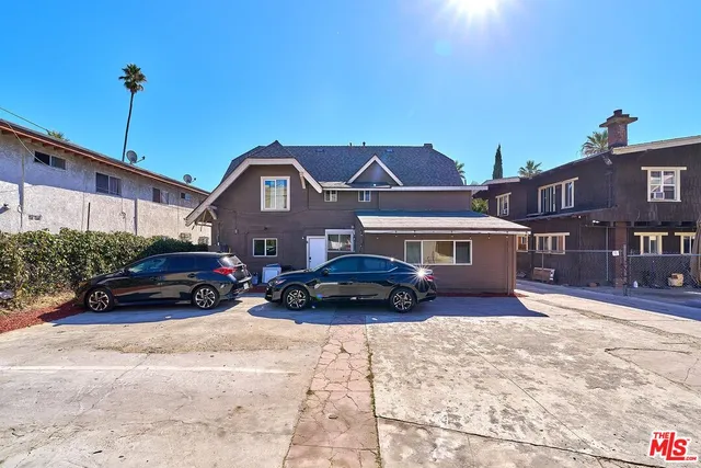 a car parked in front of a house
