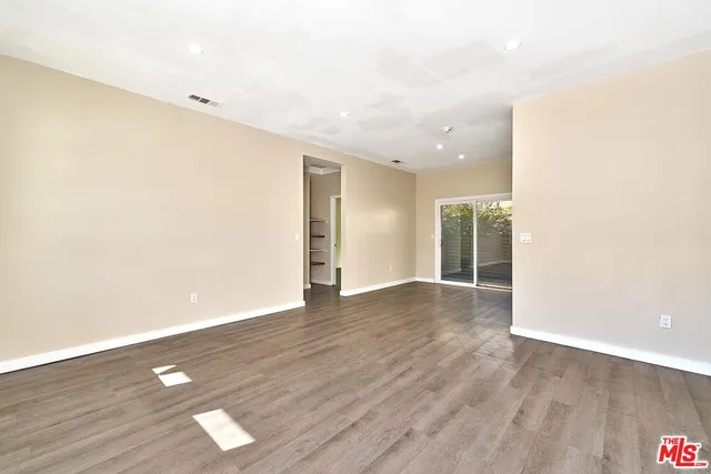 a view of livingroom with hardwood floor and window