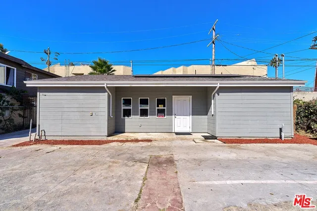 a front view of a house with a garage