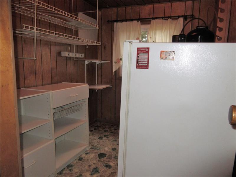 1000 Winfield Road Cabot, PA 16023 - Photo 14 of 24 The third bedroom is currently utilized for extra storage.