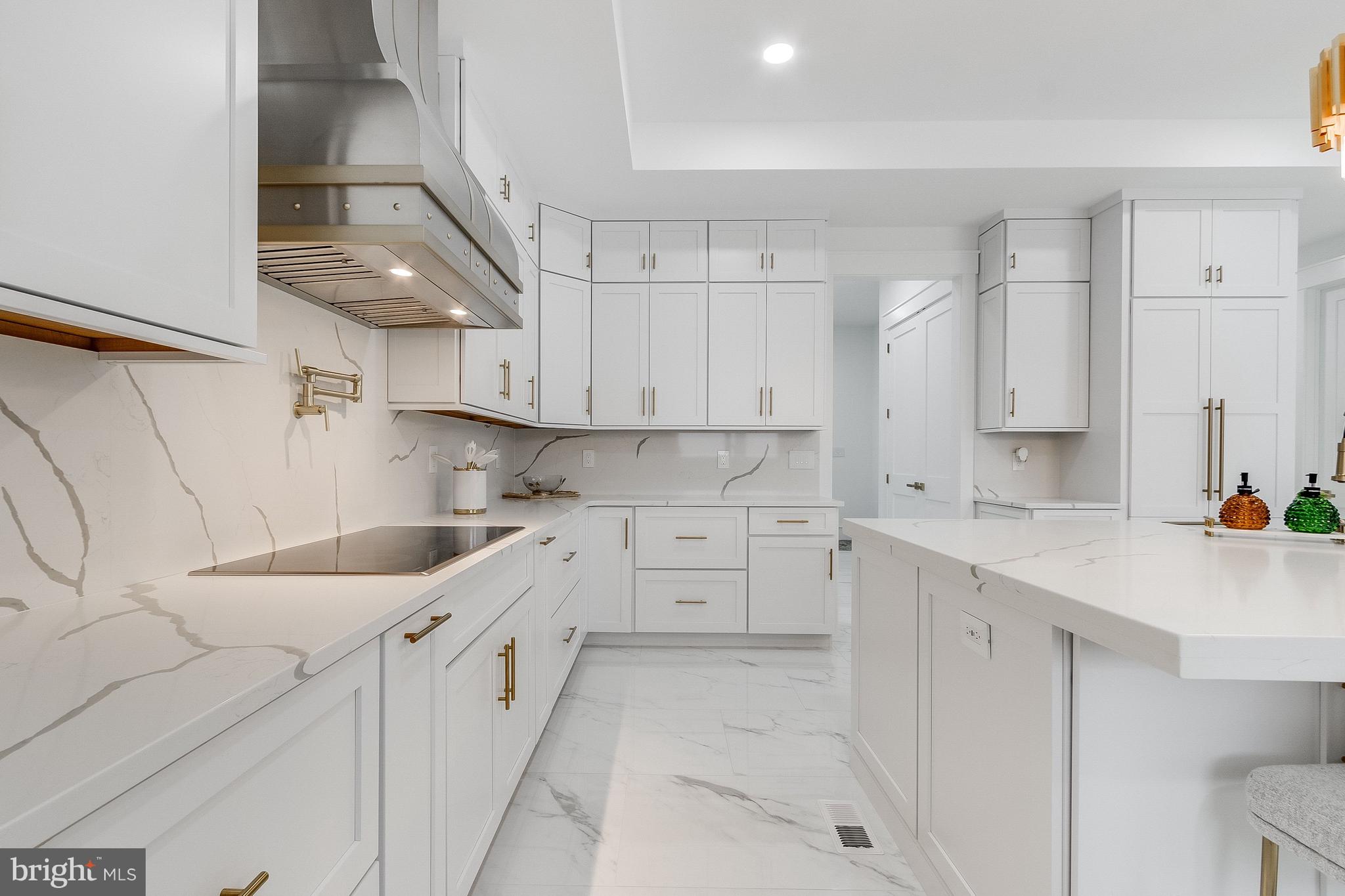 20157 West Piney Grove Road Georgetown, DE 19947 - Photo 12 of 104 a kitchen with white cabinets appliances and a sink
