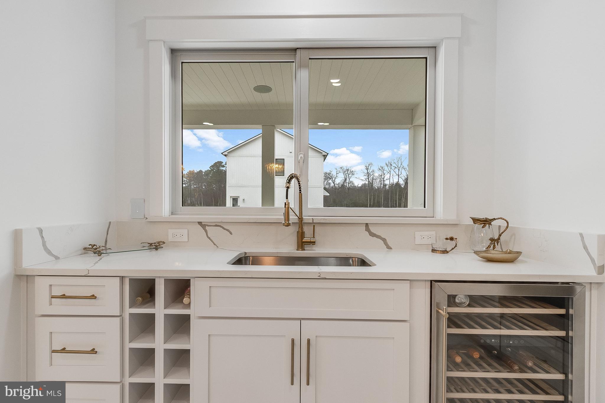 20157 West Piney Grove Road Georgetown, DE 19947 - Photo 13 of 104 a bathroom with a granite countertop sink and a mirror
