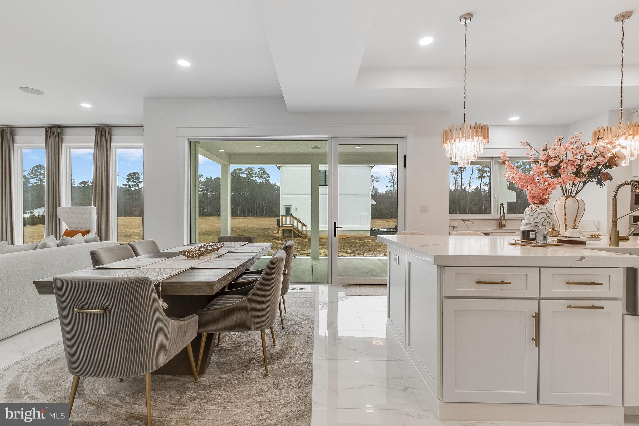 20157 West Piney Grove Road Georgetown, DE 19947 - Photo 17 of 104 Dining area/kitchen looking out to covered porch