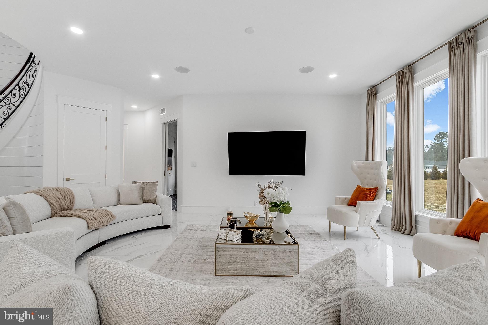 20157 West Piney Grove Road Georgetown, DE 19947 - Photo 28 of 104 a living room with furniture and a flat screen tv