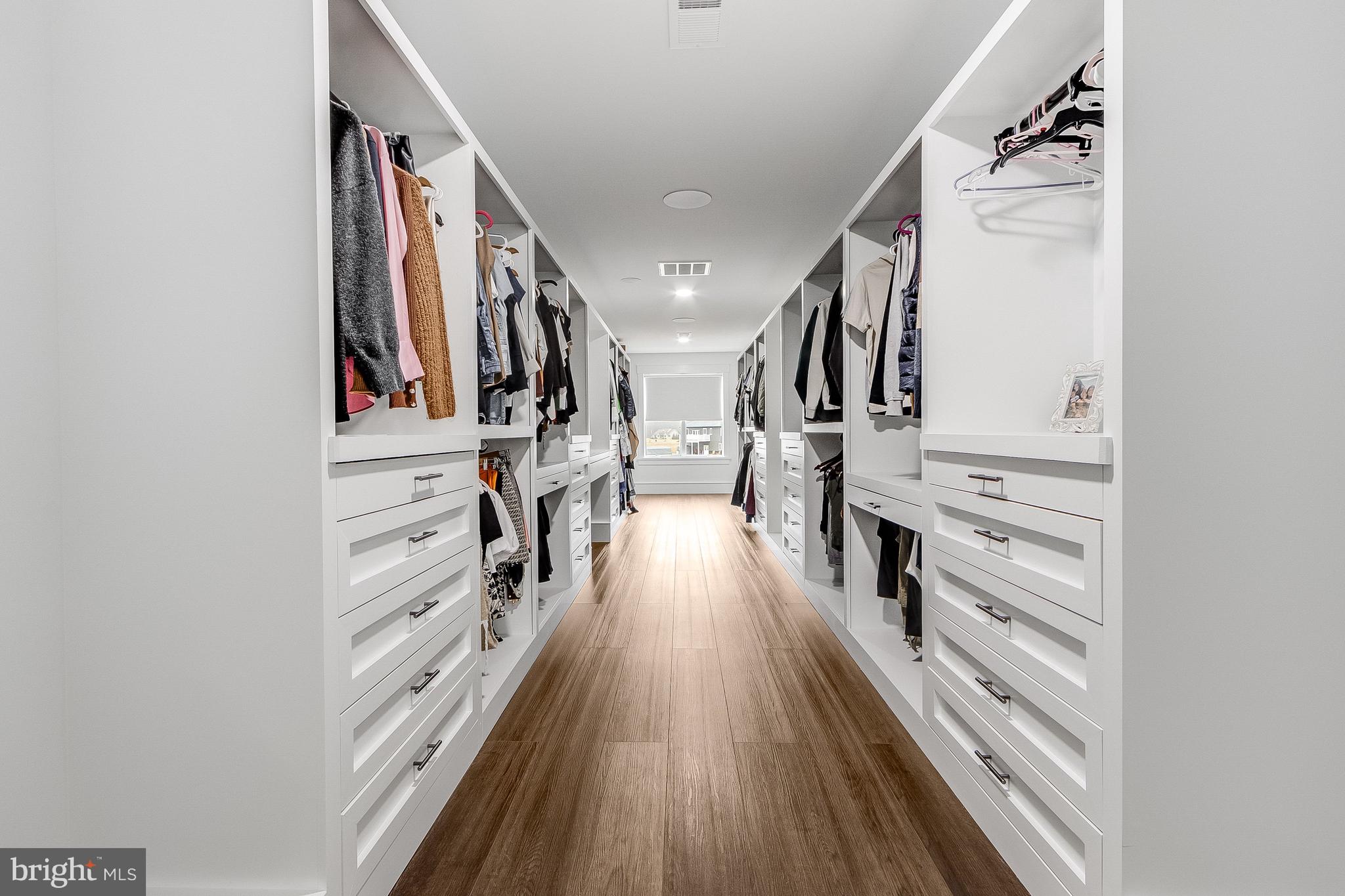 20157 West Piney Grove Road Georgetown, DE 19947 - Photo 60 of 104 a view of hallway with wooden floor and stairs