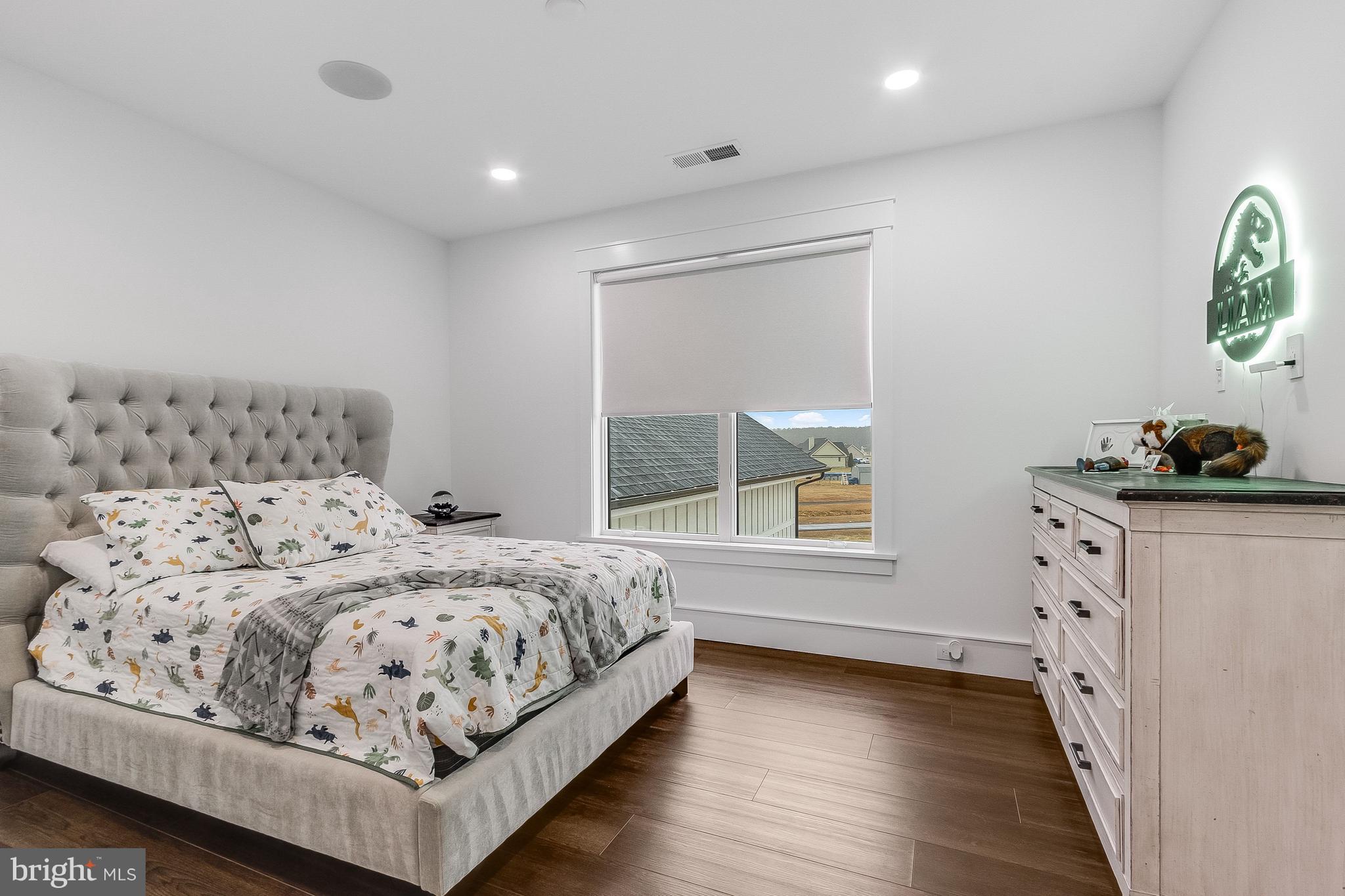 20157 West Piney Grove Road Georgetown, DE 19947 - Photo 68 of 104 a bedroom with a bed and window