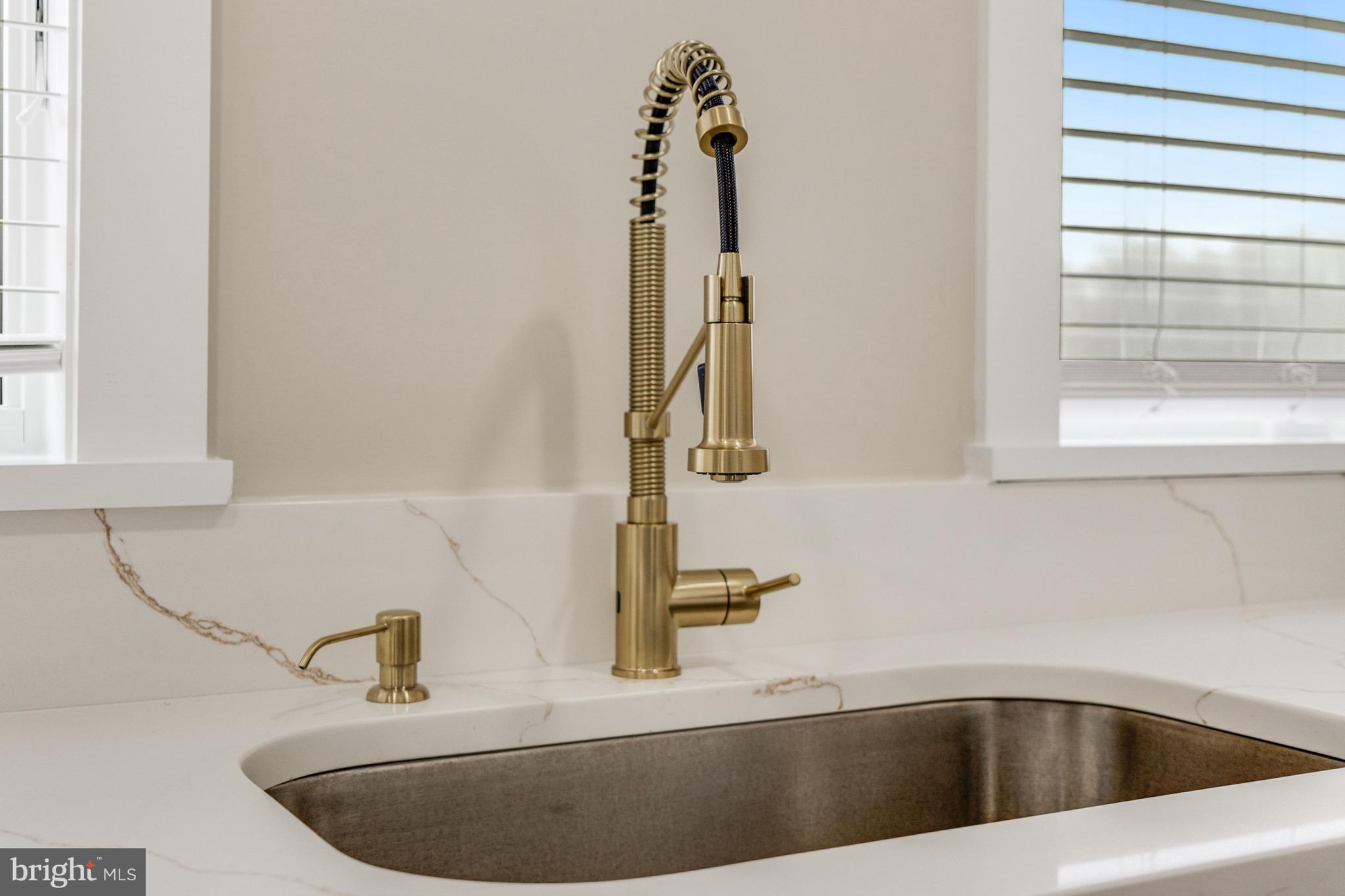 20157 West Piney Grove Road Georgetown, DE 19947 - Photo 84 of 104 a view of a bathroom sink and a window