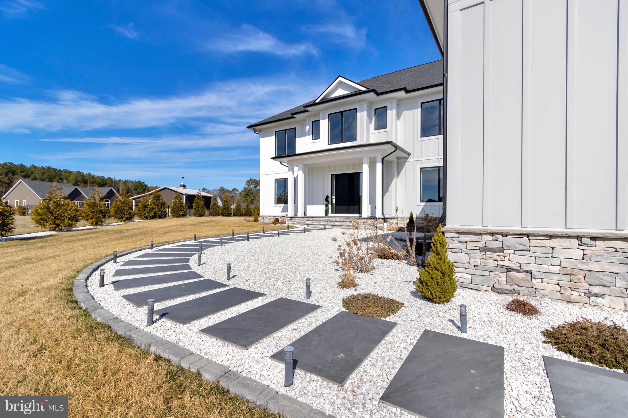 20157 West Piney Grove Road Georgetown, DE 19947 - Photo 98 of 104 a front view of a house with swimming pool