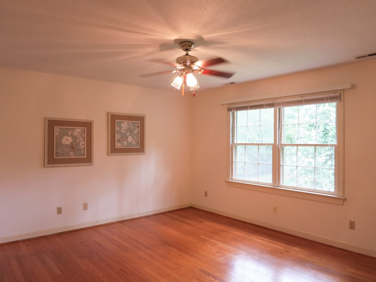 1120 Country Ridge Drive Raleigh, NC 27609 - Photo 15 of 25 Also upstairs is the spacious Master Bedroom w/2 lg closets, hardwood floor, CF & updated private Bath. Master Bedroom