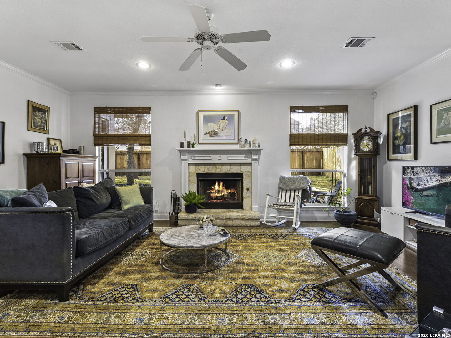 16107 La Madera Rio Helotes, TX 78023 - Photo 14 of 39 a living room with furniture and a fireplace