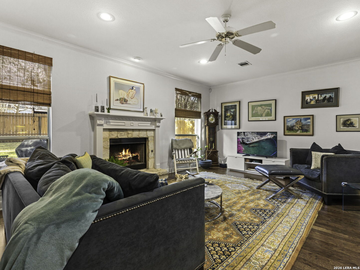16107 La Madera Rio Helotes, TX 78023 - Photo 15 of 39 a living room with furniture and a fireplace