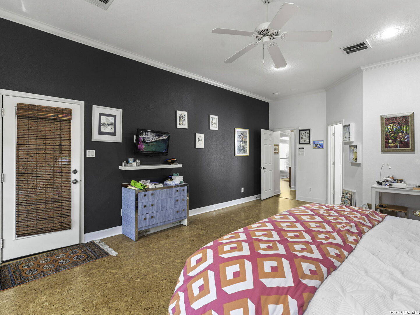 16107 La Madera Rio Helotes, TX 78023 - Photo 19 of 39 a bedroom with a bed and a dresser