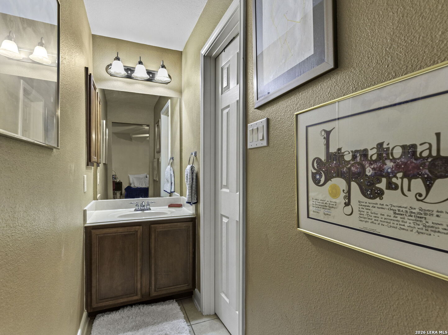 16107 La Madera Rio Helotes, TX 78023 - Photo 25 of 39 a view of a hallway with washer and dryer