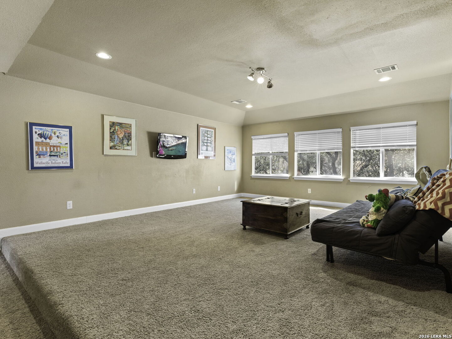 16107 La Madera Rio Helotes, TX 78023 - Photo 26 of 39 a living room with furniture and windows