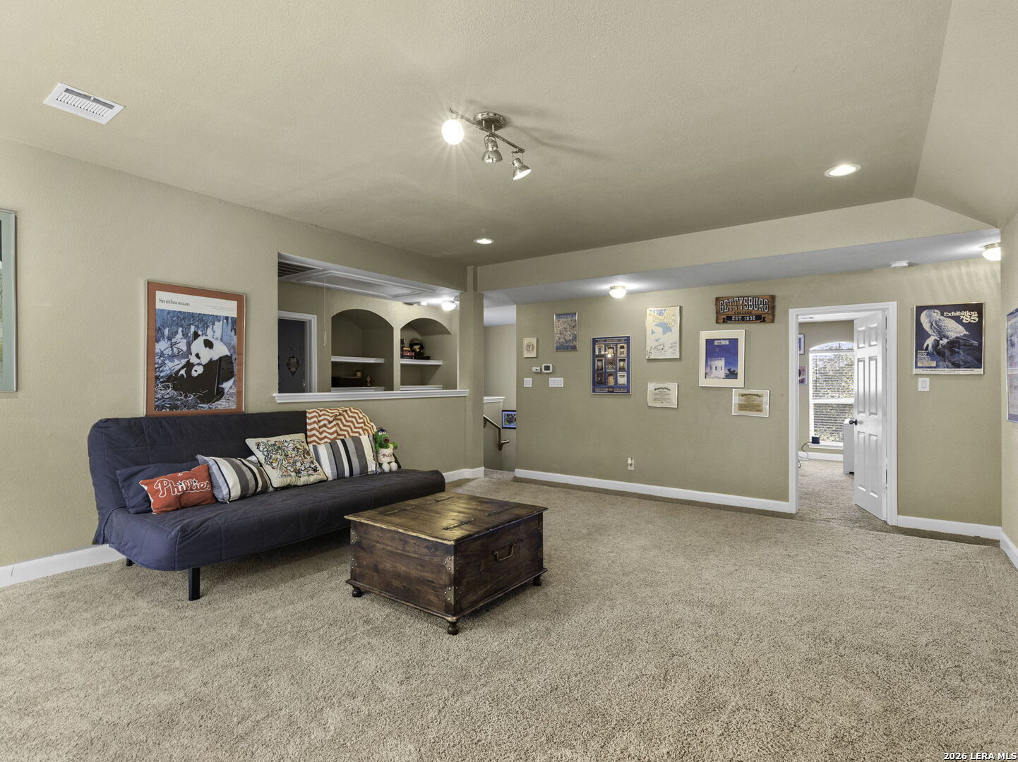 16107 La Madera Rio Helotes, TX 78023 - Photo 28 of 39 a living room with furniture and a chandelier