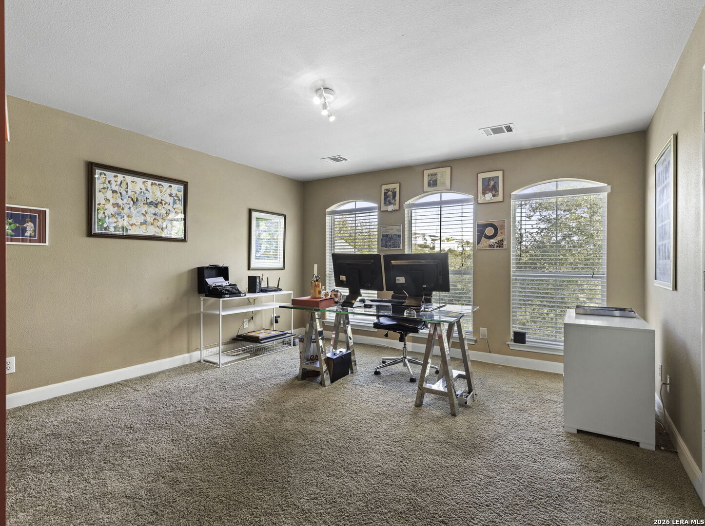 16107 La Madera Rio Helotes, TX 78023 - Photo 29 of 39 a living room with furniture and a flat screen tv