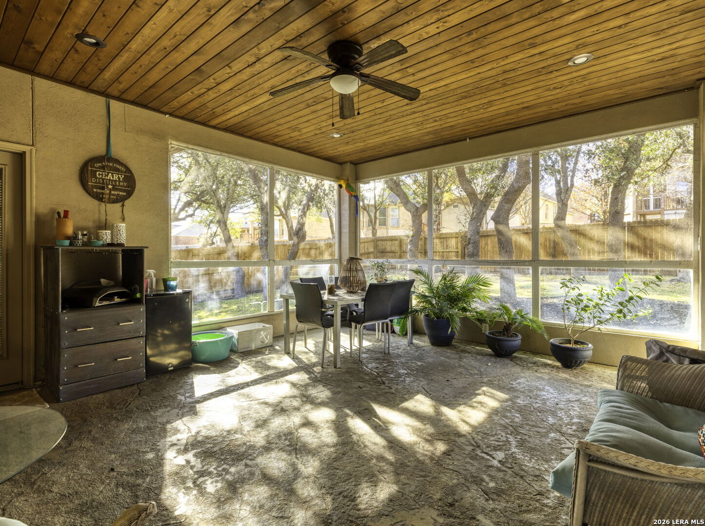 16107 La Madera Rio Helotes, TX 78023 - Photo 32 of 39 a living room with furniture and a large window