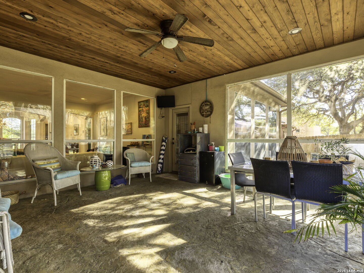 16107 La Madera Rio Helotes, TX 78023 - Photo 33 of 39 a living room with furniture and a large window