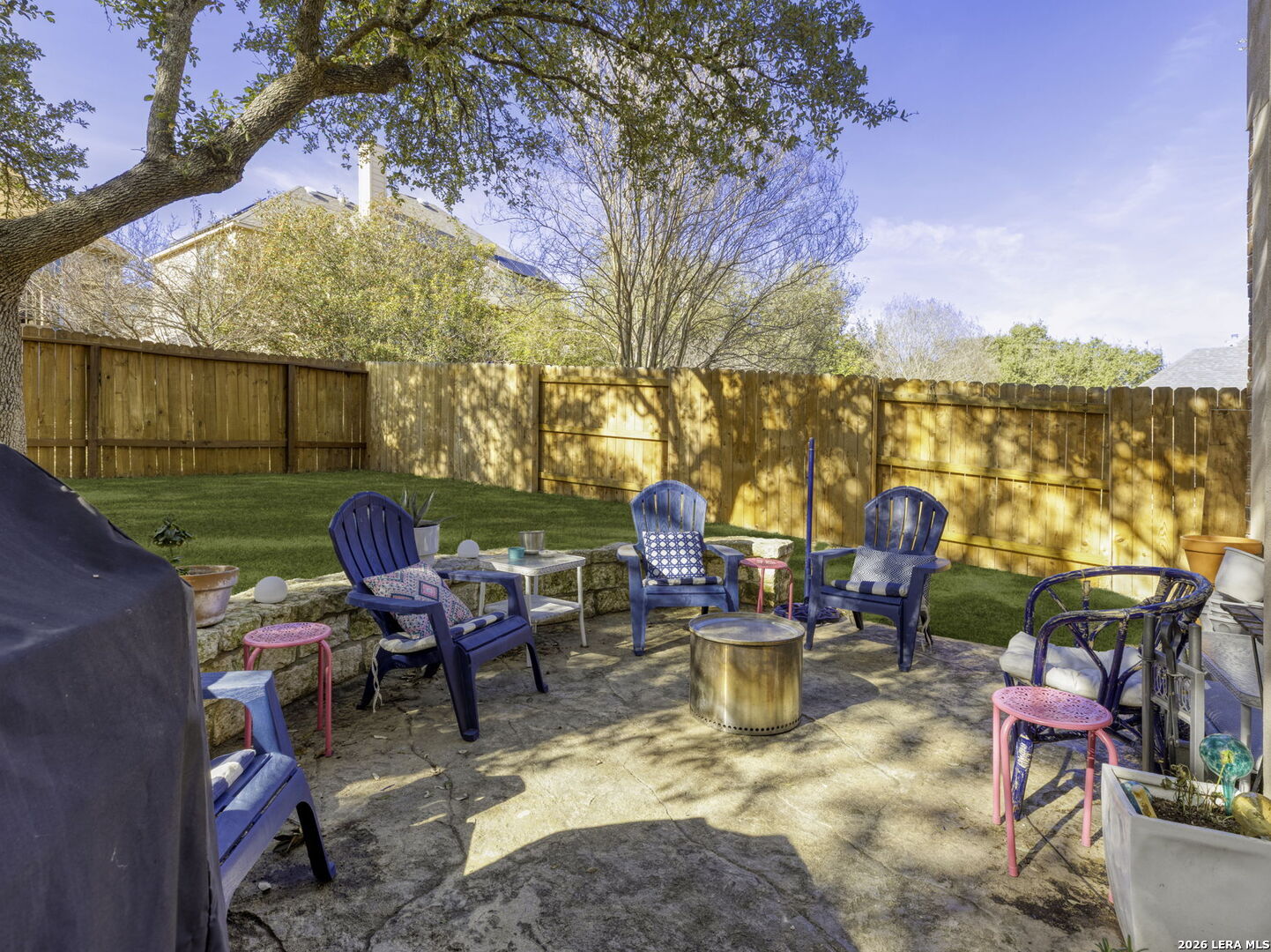 16107 La Madera Rio Helotes, TX 78023 - Photo 34 of 39 a backyard of a house with table and chairs