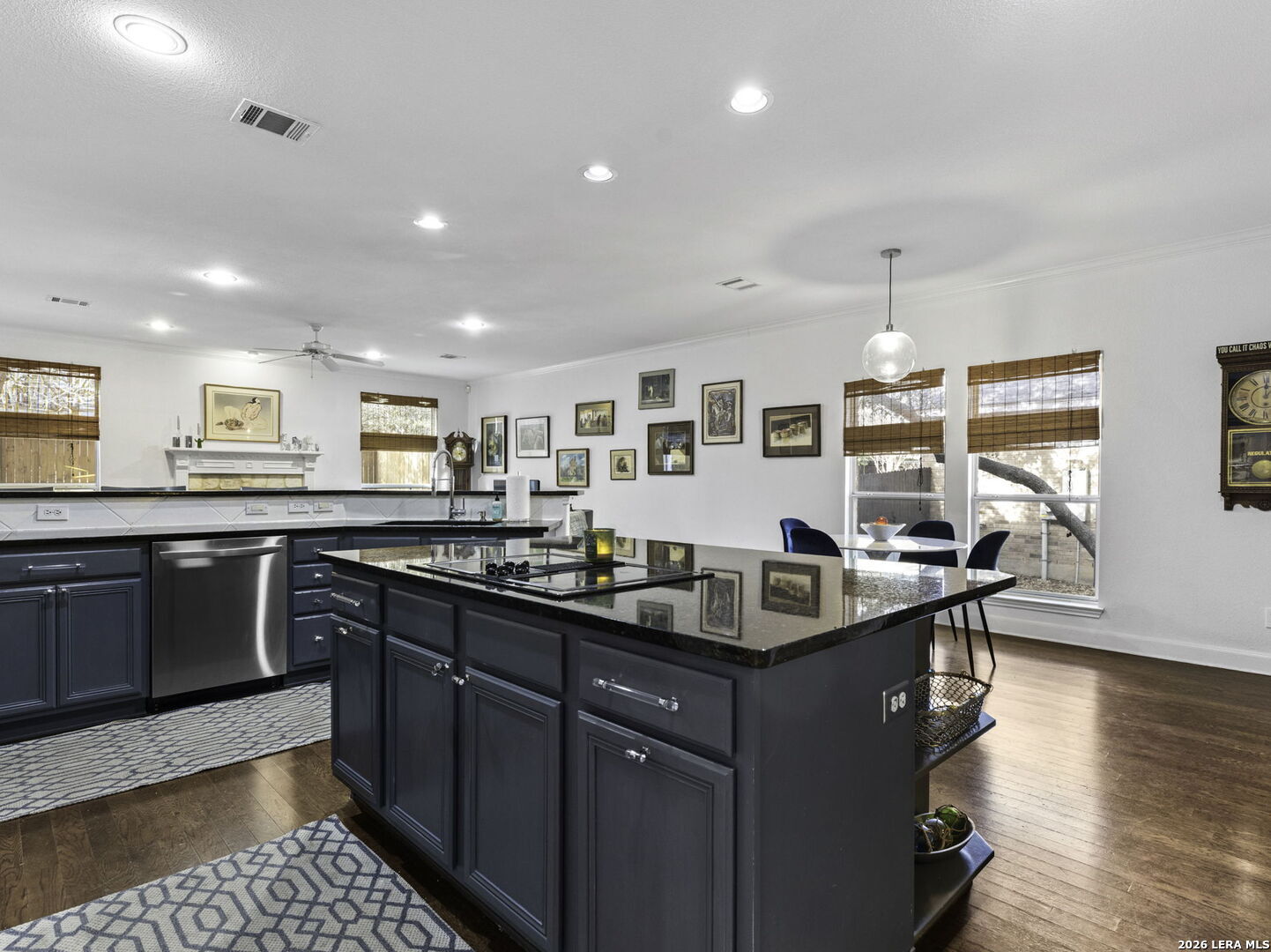 16107 La Madera Rio Helotes, TX 78023 - Photo 8 of 39 a kitchen with stainless steel appliances granite countertop a sink and stove